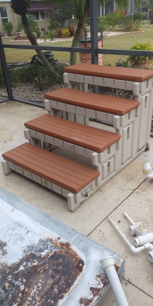 Spa steps, 32 " tall. Made from Hard plastic. 4 steps. You pick up. 40