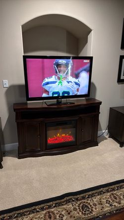 TV stand w/heater, + TV