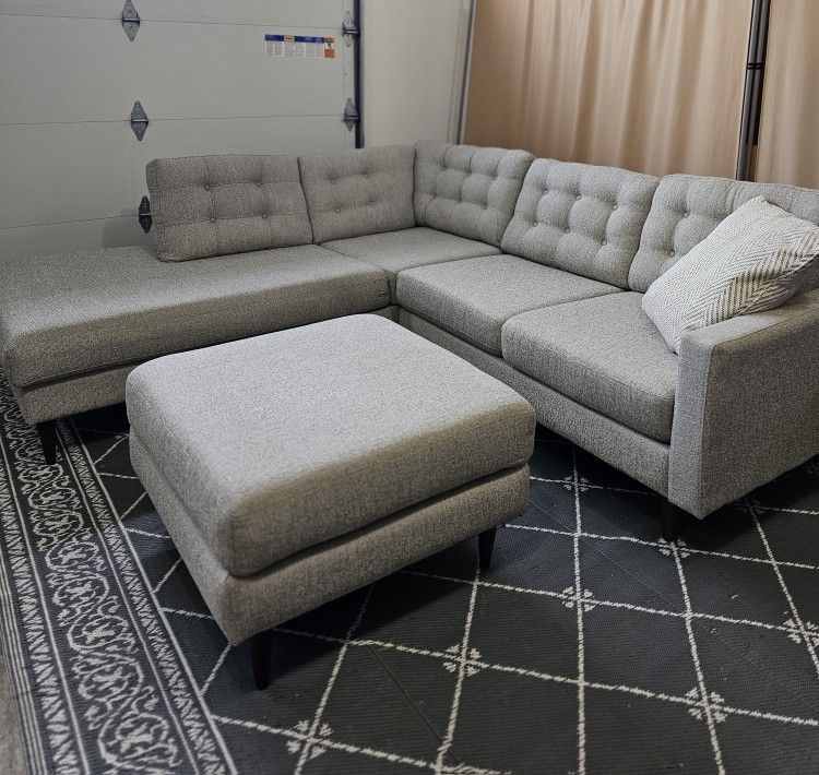 L-shaped sectional sofa with ottoman