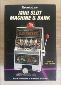 Brookstone MINI SLOT MACHINE & BANK. New and sealed