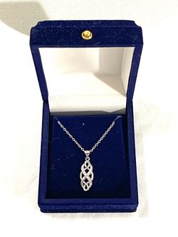 Brand new Infiniti design .925 silver necklace pendant with CZ diamonds