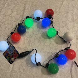 Disney Park Bulb Glow Necklace $10