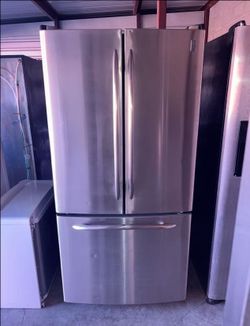 GE Stainless Steel Refrigerator And Freezer
