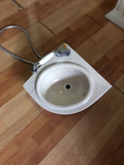 Fiberglas marine sink with combo faucet and shower