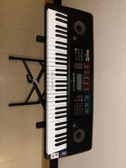 RockJam 61-Key electronic keyboard, likely the RJ761 or a similar model from one of their kits. These models are designed for beginners and come with 