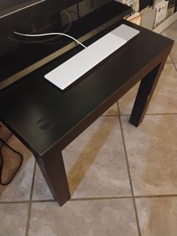 Dark wood coffee table $3