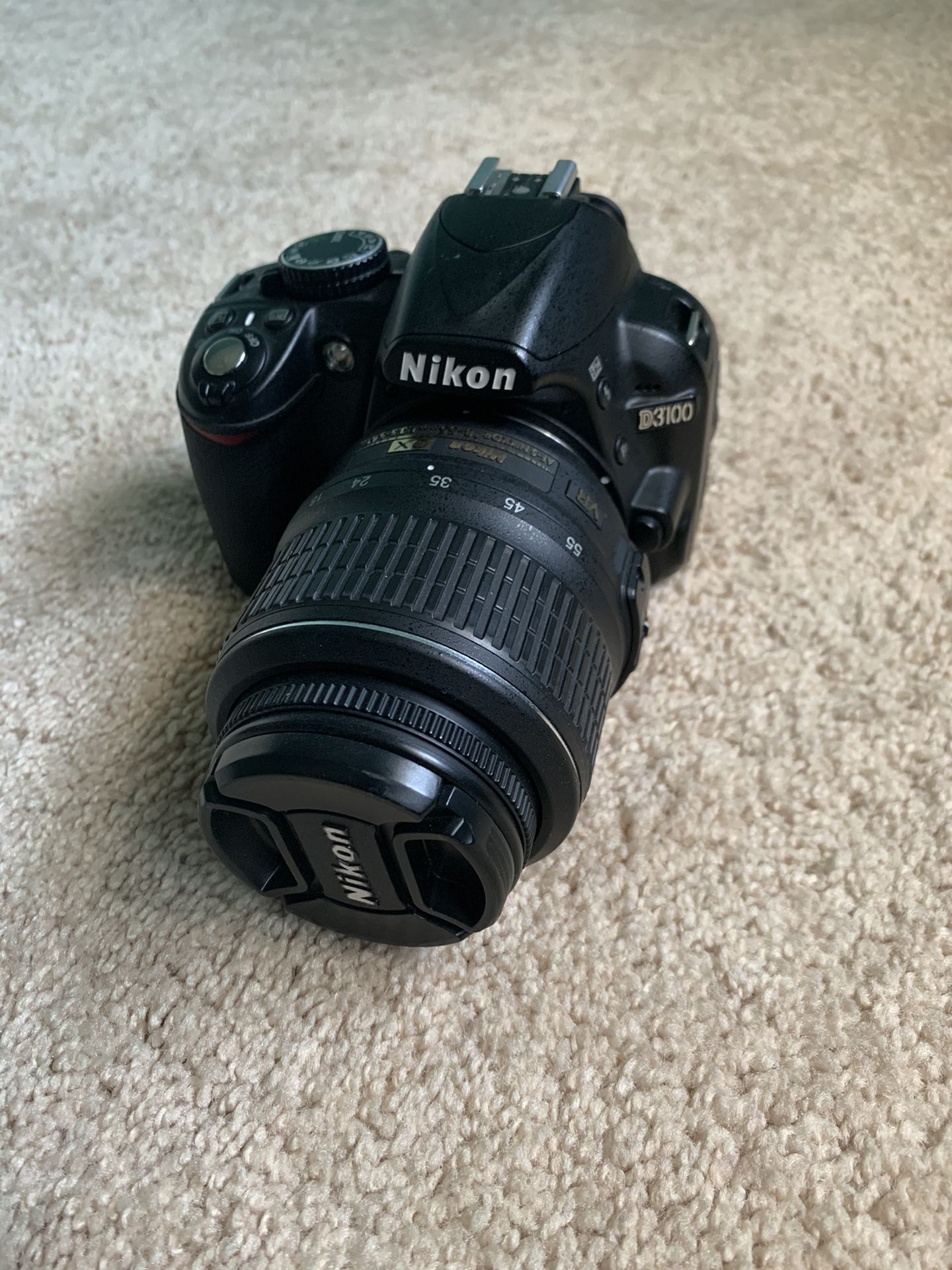 Nikon D3100 with lens