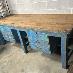 Vintage industrial workbench with drawers and solid wood top (butcher block).