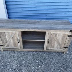 TV Stand -( size: 58.1/2”x 15.1/2”x 25”in high, wood & particle board )- Used 