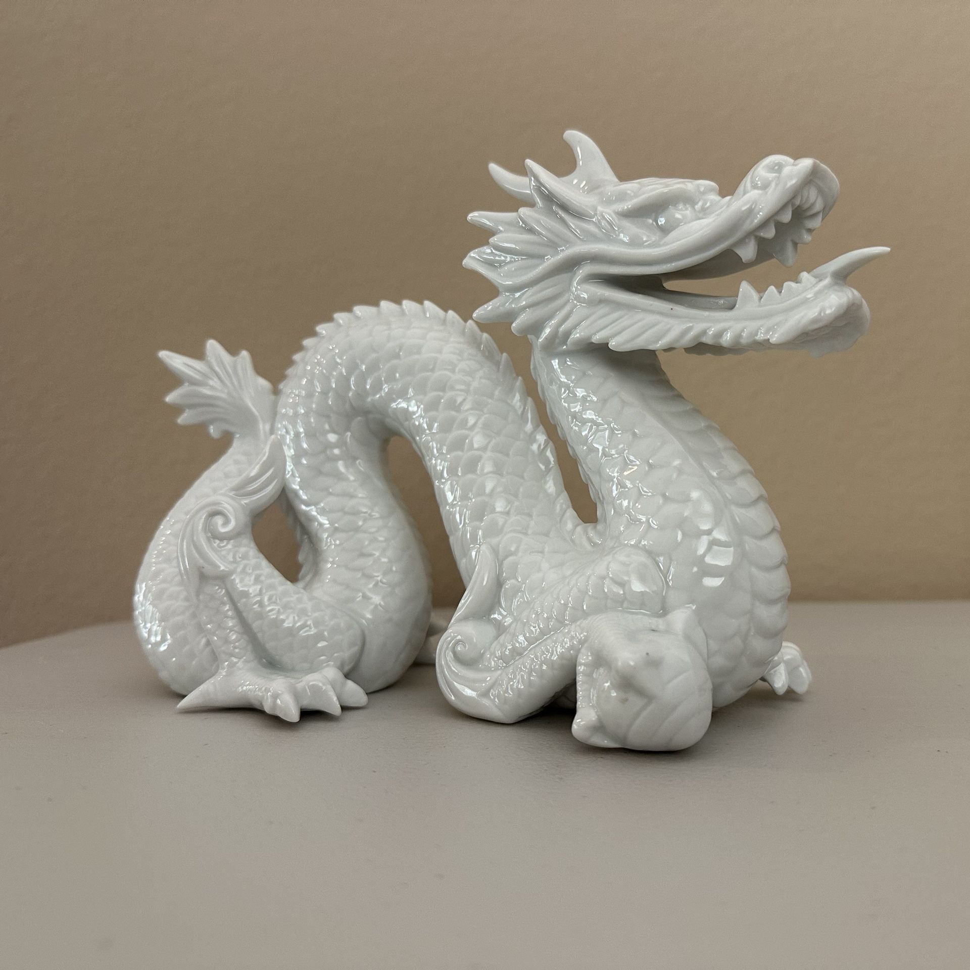 Beautiful vintage Japanese porcelain dragon .