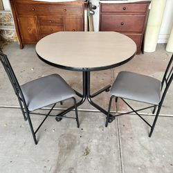 Newly restored Table on Casters and two chairs