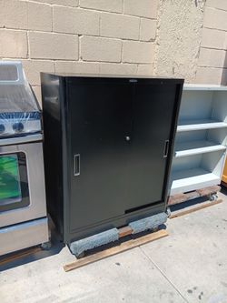 Vintage McDowell&Craig  2-door cabinet firm