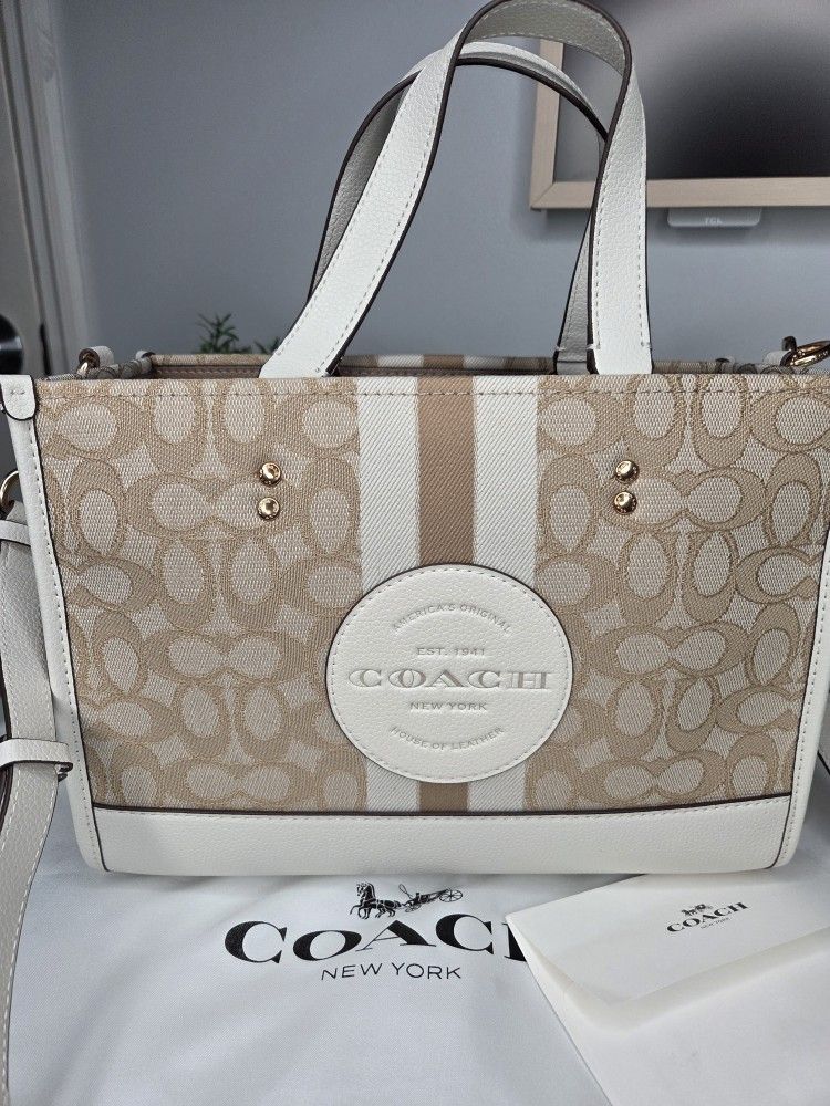 Coach Dempsey Carryall in Signature Jacquard with Stripe and Coach Patch tote bag. 