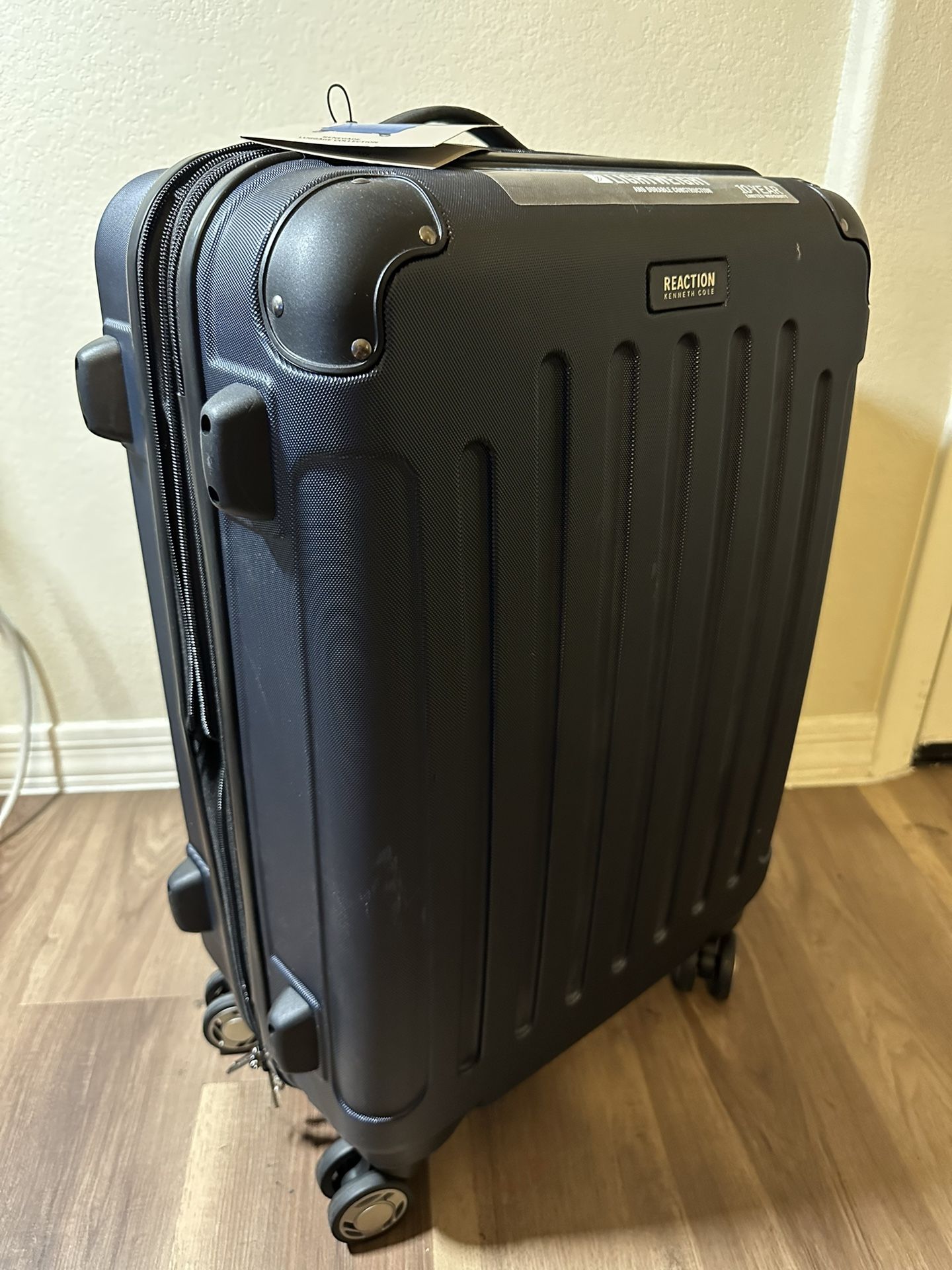 Kenneth Cole Reaction Renegade 24” Spinner Luggage Suitcase