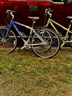 His and hers hybrid TREK road bikes