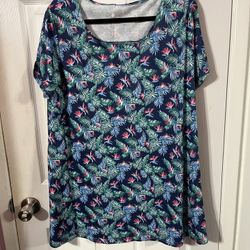 Women’s Size 3X Tunic Top with Blue background.  Material 65% Cotton and 35% Polyester.  Brand new never worn.  Has been hanging in the closet.  Smoke