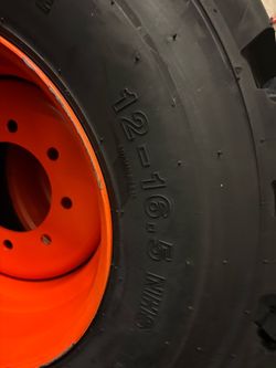 4 Bobcat tires with rim 12-16.5 $1600
