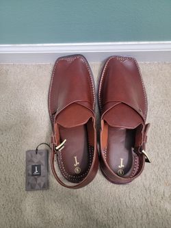 Brand new maroon j. Men sandals size 8. (MUST SELL TODAY)
