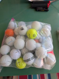 50 Titleist Golf Balls, used