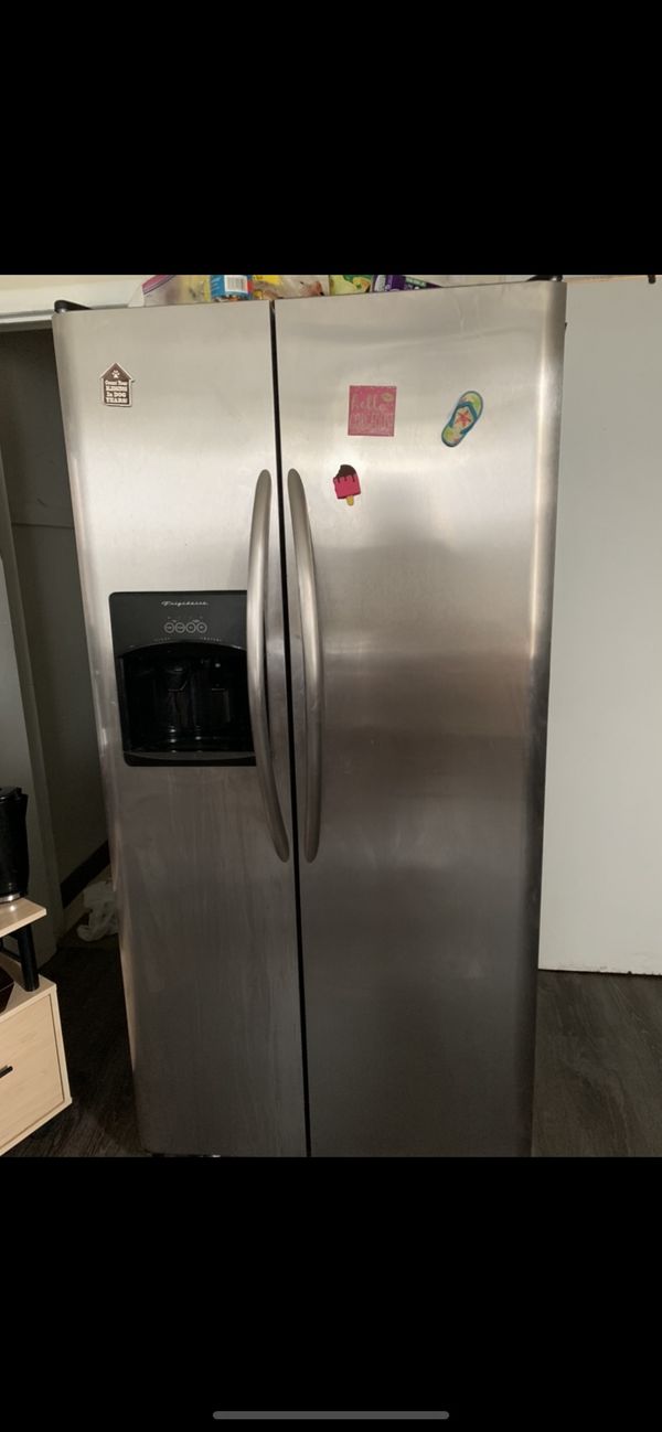 side by side refrigerator with water dispenser and ice maker for Sale
