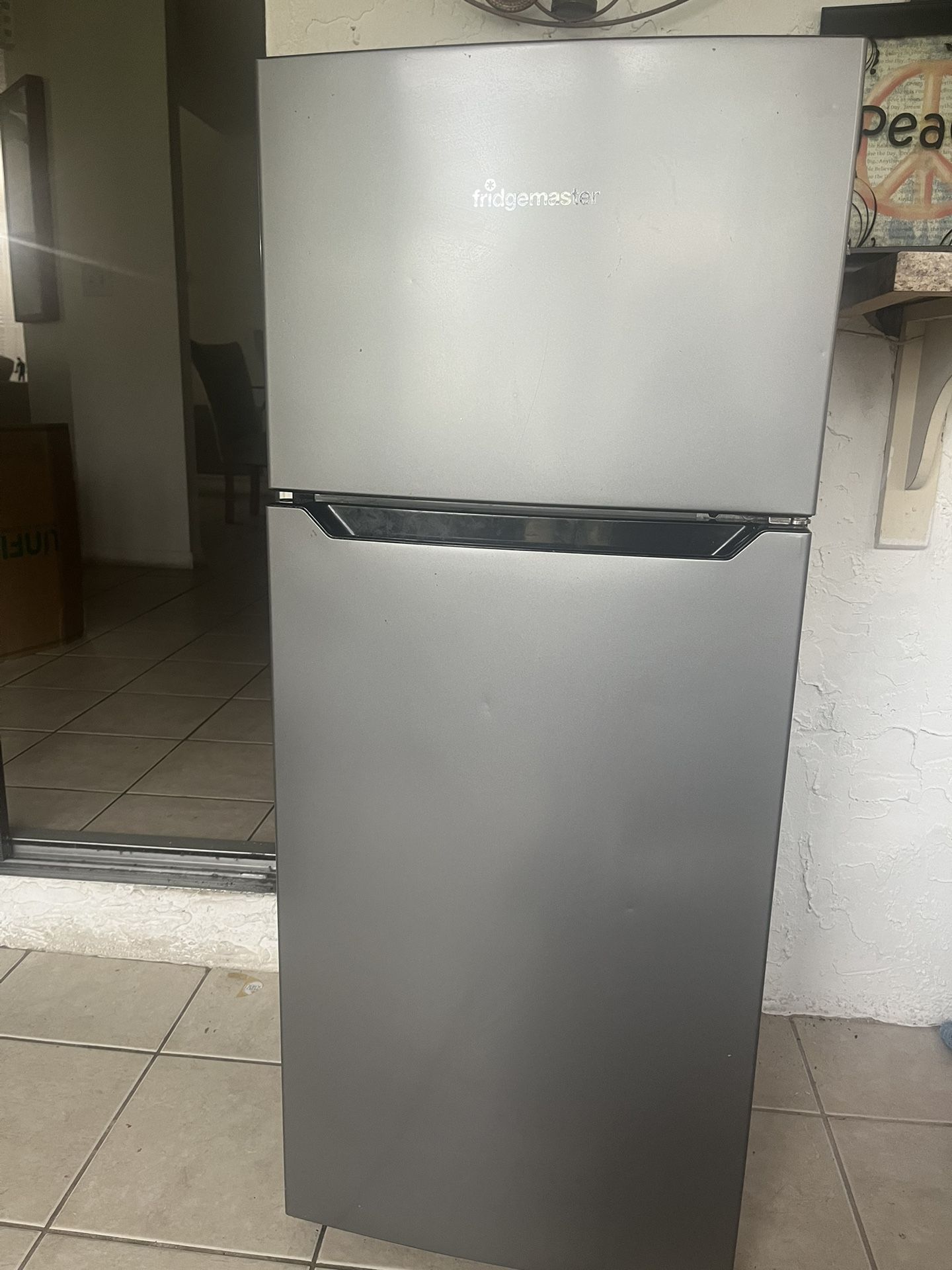 Refrigerator In Perfect Condition 44 Inches Tall 89 1/2 Wide 891/2 Deep. cash Only