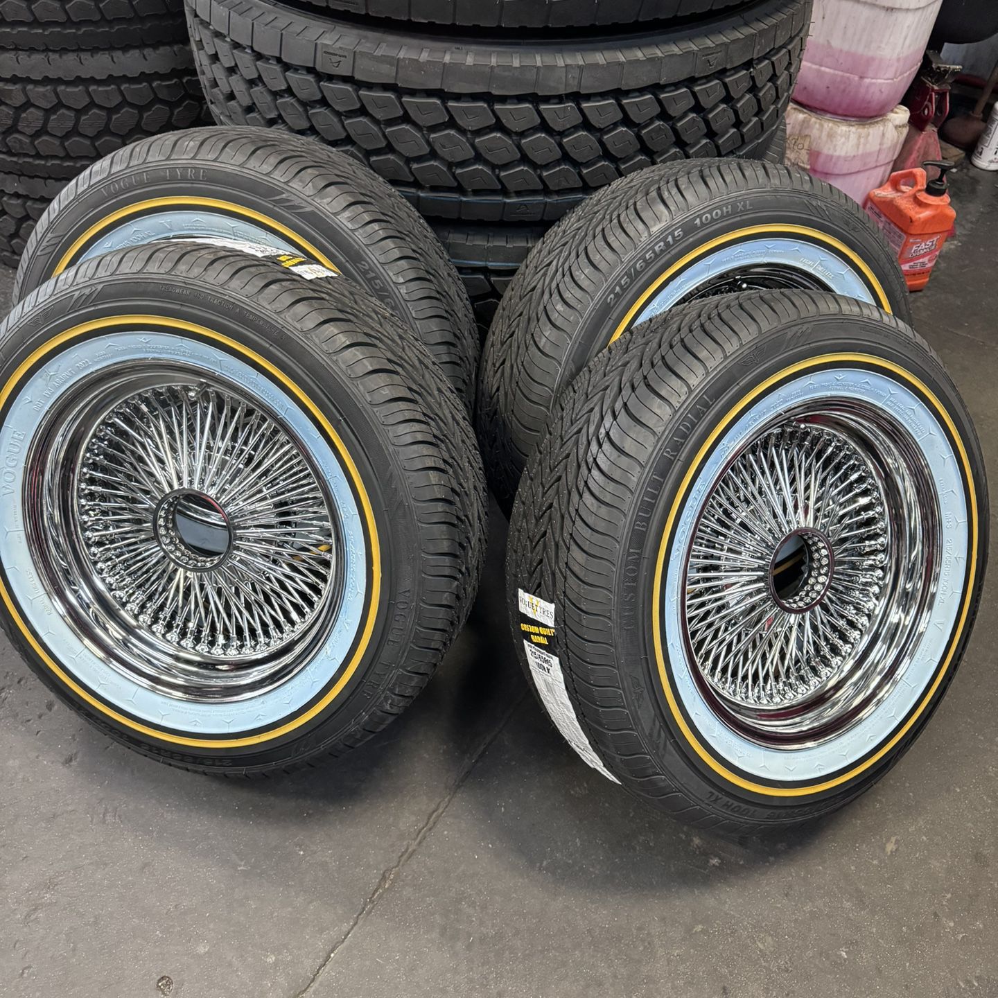 15X7” WIRE WHEELS WITH 215/65R15 VOGUE TIRES WITH INSTALLATION AND BALANCING 