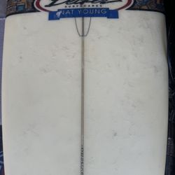 Surfboard: Becker 9’ Nat Young 3 fins, leash with Dakine Carry Bag