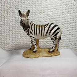 Aldon 1974 Zebra figurine fine grained porcelain measures 5 1/2" T X 4 3/4" L X 2 1/8" W . Good condition and smoke free home.  From Japan