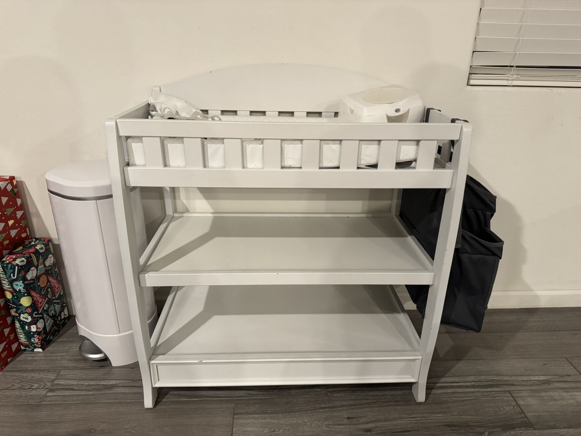 Changing table, wet wipe warmer, and diaper pail