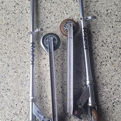 Set Of 2 Razor  Scooters - 2 wheeled in good condition.
