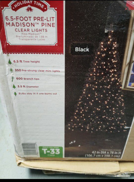 Black 6.5 foot pre lit madison pine clear lights 
