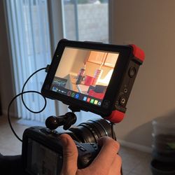 Blackmagic Pocket Cinema 4K (includes small rig and lens)