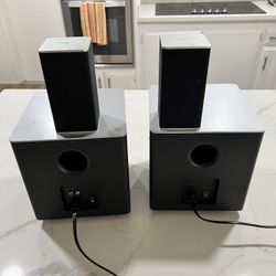 Two Vizio Subs And Side Speakers 