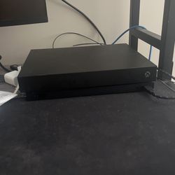 Xbox One X with games installed