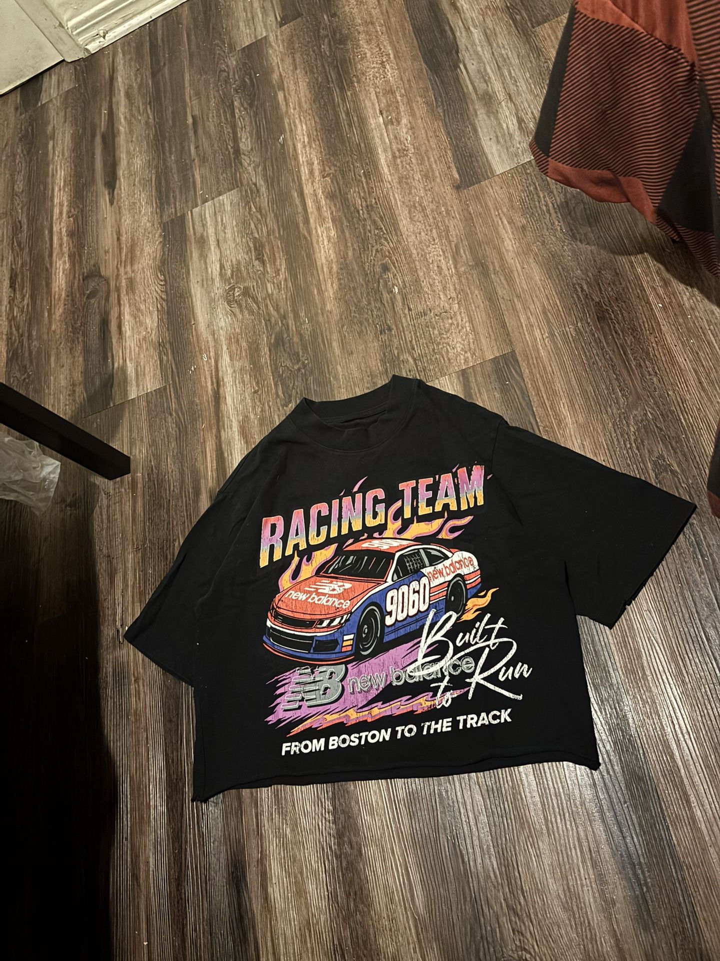 Black cropped racing tee with multi-coloured graphics #racingtee  black, cropped, graphic, racing, multicolor, vintage-inspired, streetwear, athletic,