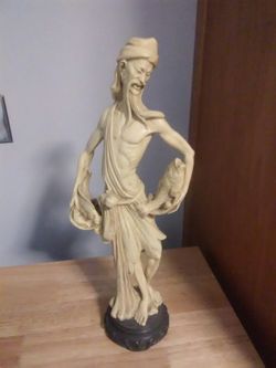 Asian Sculpture man holding fish 19" tall with base