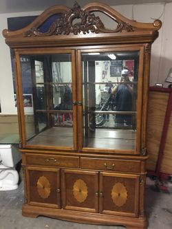 Chaina cabinet with 2 drawers, glass shelves.
