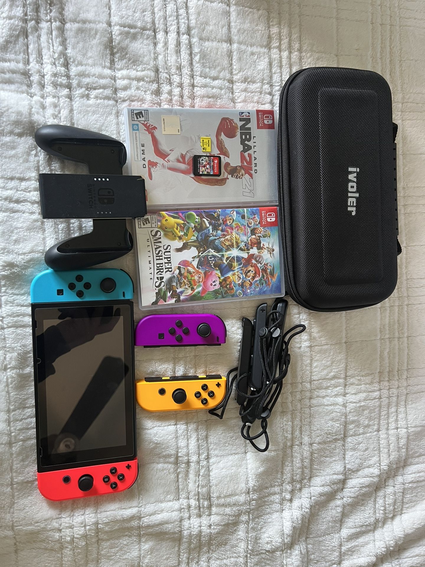 Nintendo Switch with (2) Multi Color Joy Con Controllers Games