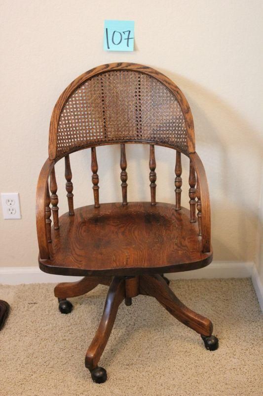 Cane backed oak Swivel chair