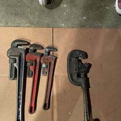 Pipe cutter and pipe wrench