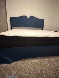 Blue Upholstered Headboard with Nailhead Trim