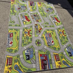 Large 5x7’ Kids Street Rug in good shape!