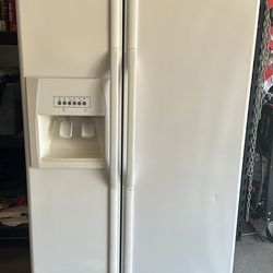 Whirl Pool Side By Side Refrigerator W/Ice Maker
