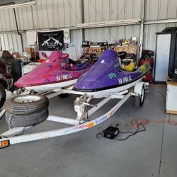 2 Kawasaki jet ski with dual trailer 