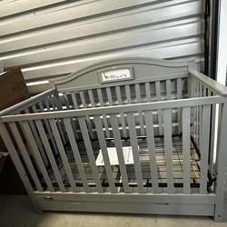Graco grey crib and changing table dresser