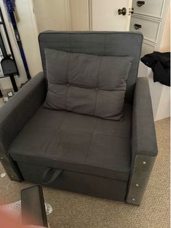Chair reclines back to a sleeper bed
