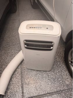 Preowned working Midea 14000 bpu ac unit portable  great for garage and rooms, used twice . Pick up 89131 zip