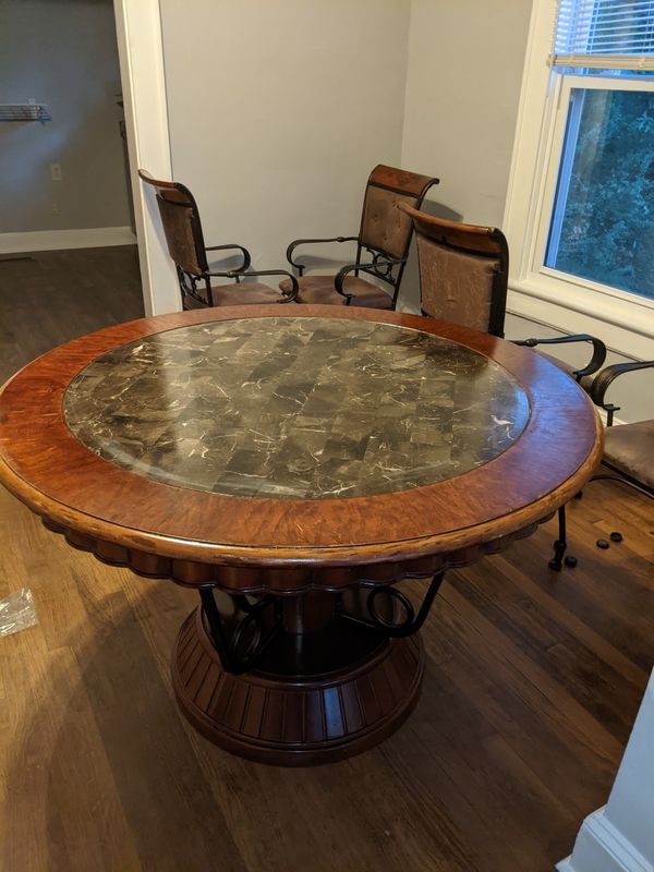 Luxurious circular dining table with matching four chairs for Sale in