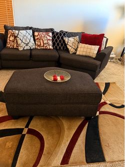 2 piece sectional set with Ottoman and Rug