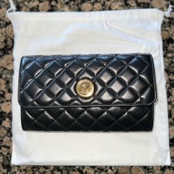 Versace leather quilted clutch purse